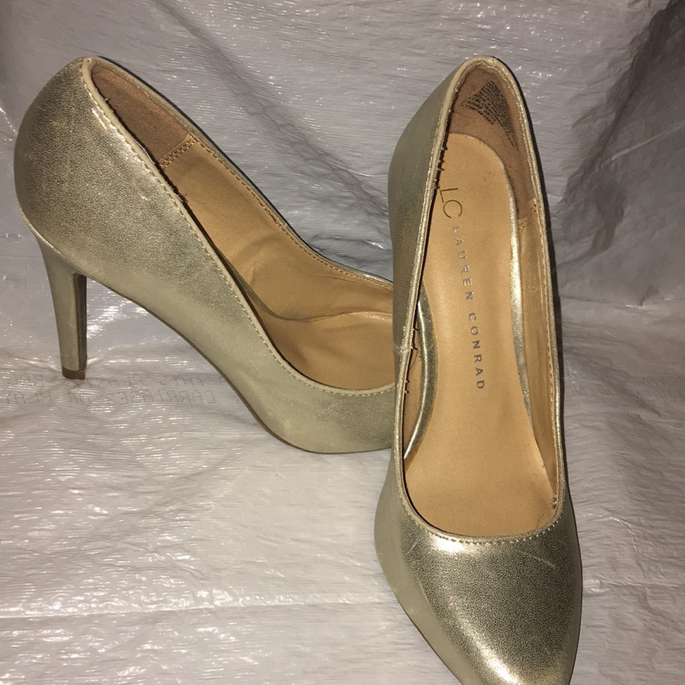 Gold high heel pumps
